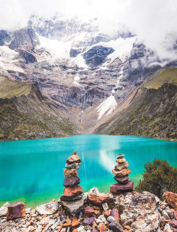 Stacked stones on Humantay lake in Peru in the Andes